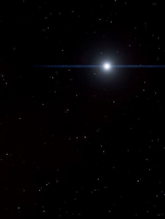David: a white dwarf, a cold blue-white point with a lens streak, alone in the dark
